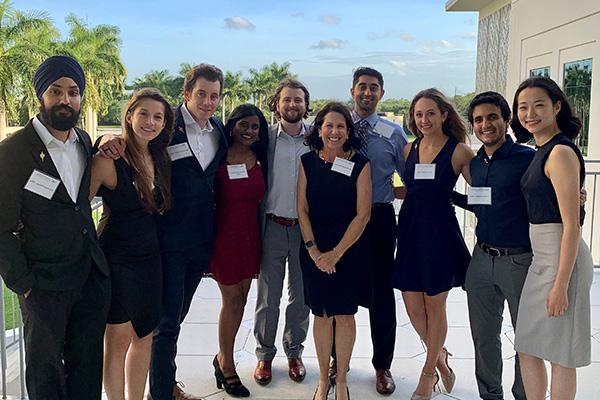 FAU M.D. students on Schmidt College of Medicine building rotunda